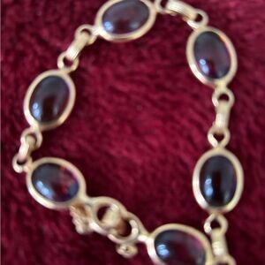 Gold-Tone Bracelet with Deep Red Oval Stones